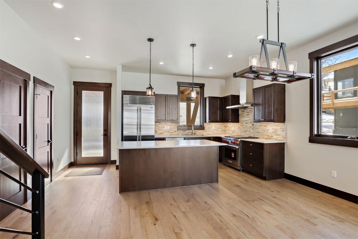 62 Vendette Road Silverthorne, CO 80498 - Photo 6 of 35 a kitchen with stainless steel appliances granite countertop a stove and refrigerator