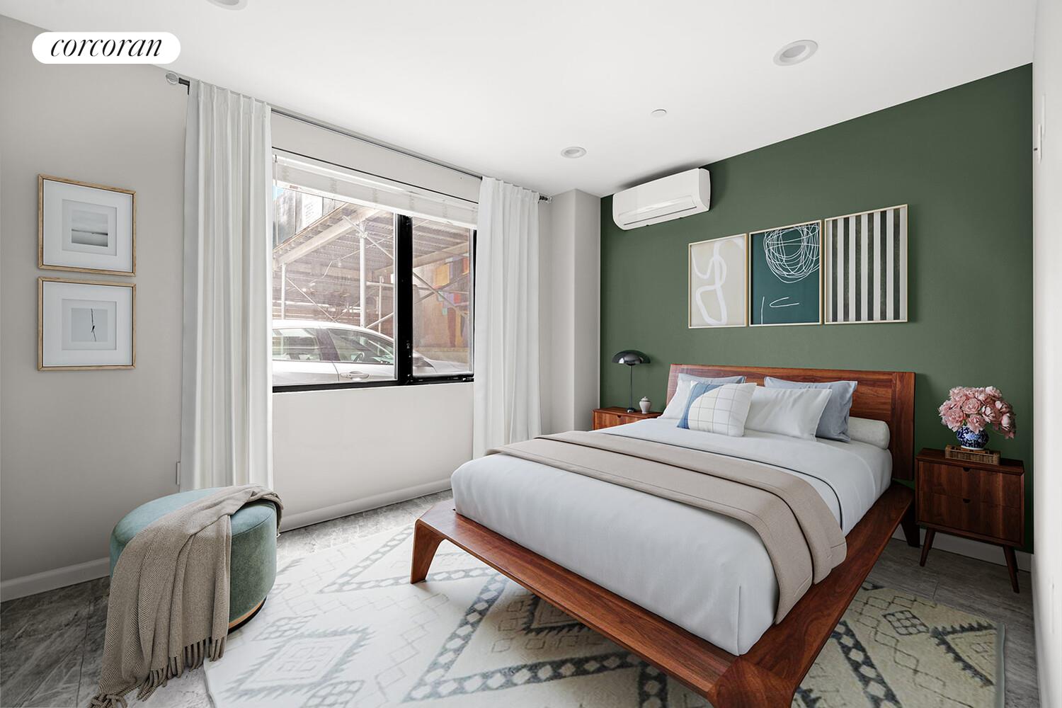 31-10 28th Road, Unit A1 Queens, NY 11102 - Photo 4 of 10 a bedroom with bed and window