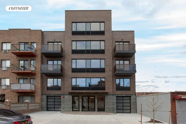 a view of front door with furniture and a shower