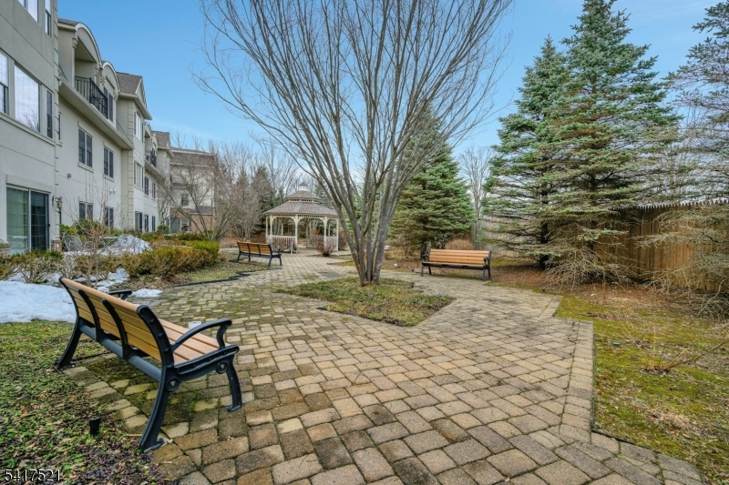 16 Main Street, Unit D6 Sparta, NJ 07871 - Photo 33 of 37 a view of a backyard with sitting area