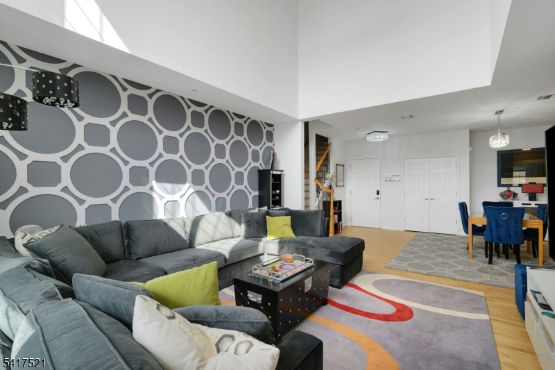 16 Main Street, Unit D6 Sparta, NJ 07871 - Photo 7 of 37 a living room with furniture and a couch
