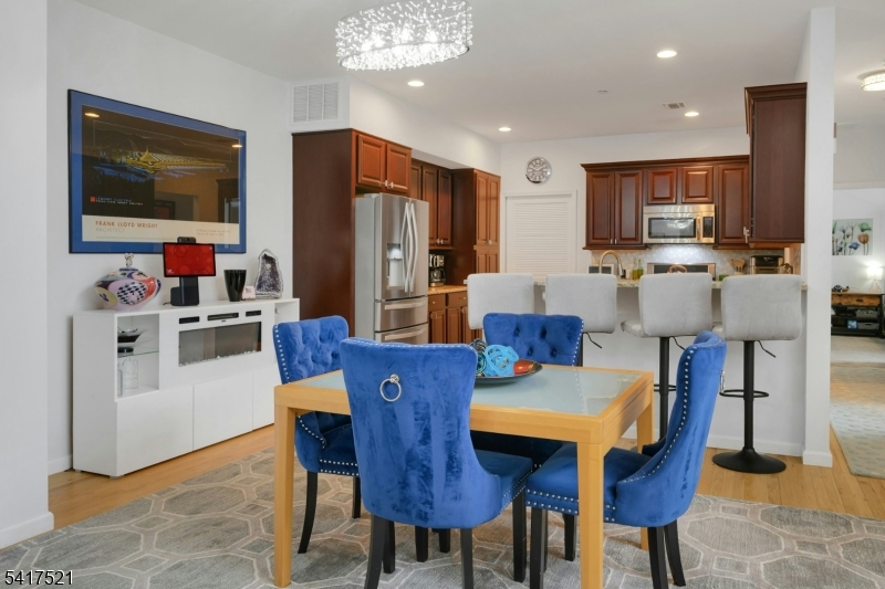 16 Main Street, Unit D6 Sparta, NJ 07871 - Photo 9 of 37 a view of kitchen with furniture and a refrigerator