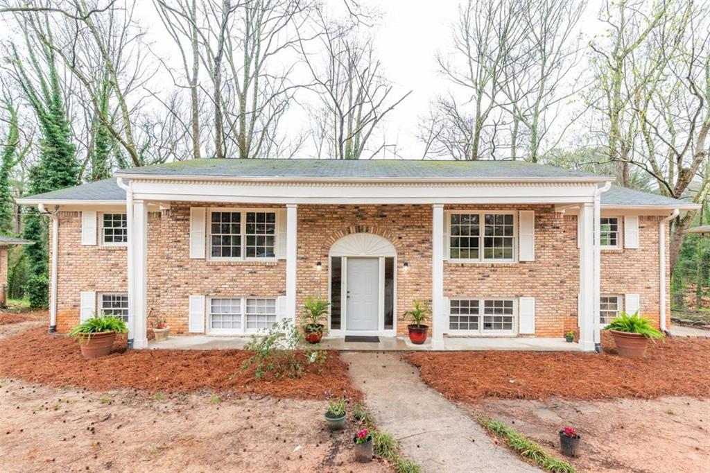 front view of a house with a patio