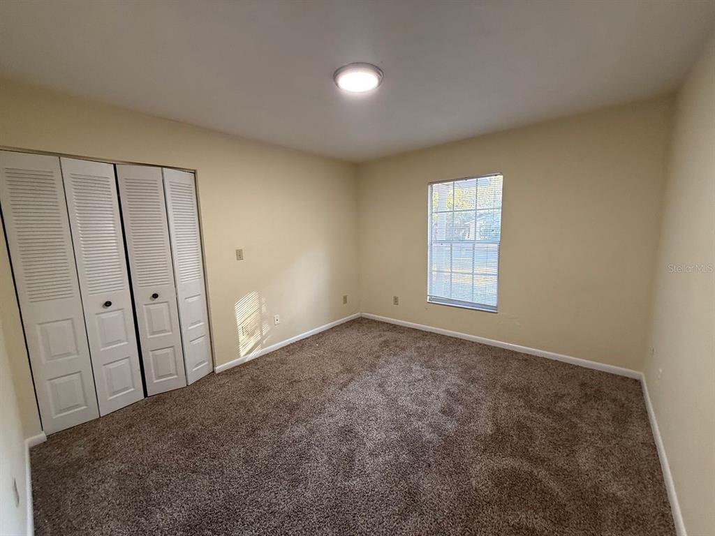 1100 Southwest 20 Place Gainesville, FL 32601 - Photo 20 of 20 a view of an empty room and a window