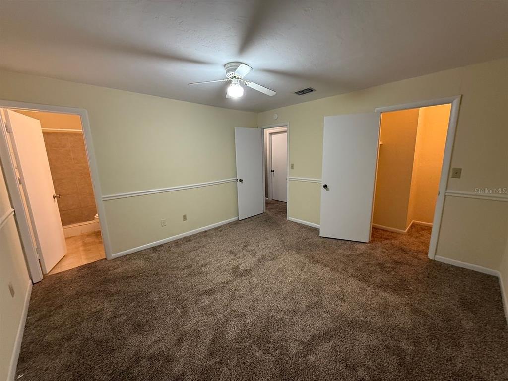 1100 Southwest 20 Place Gainesville, FL 32601 - Photo 10 of 20 a view of an empty room with a window