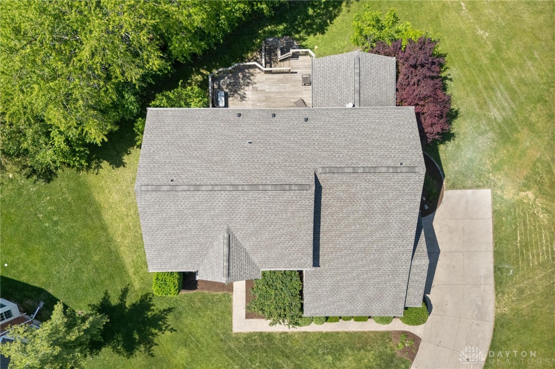 70 Martin Lane Springboro, OH 45066 - Photo 64 of 69 An overhead perspective reveals a residence with a deck, a lush lawn, and surrounding trees.