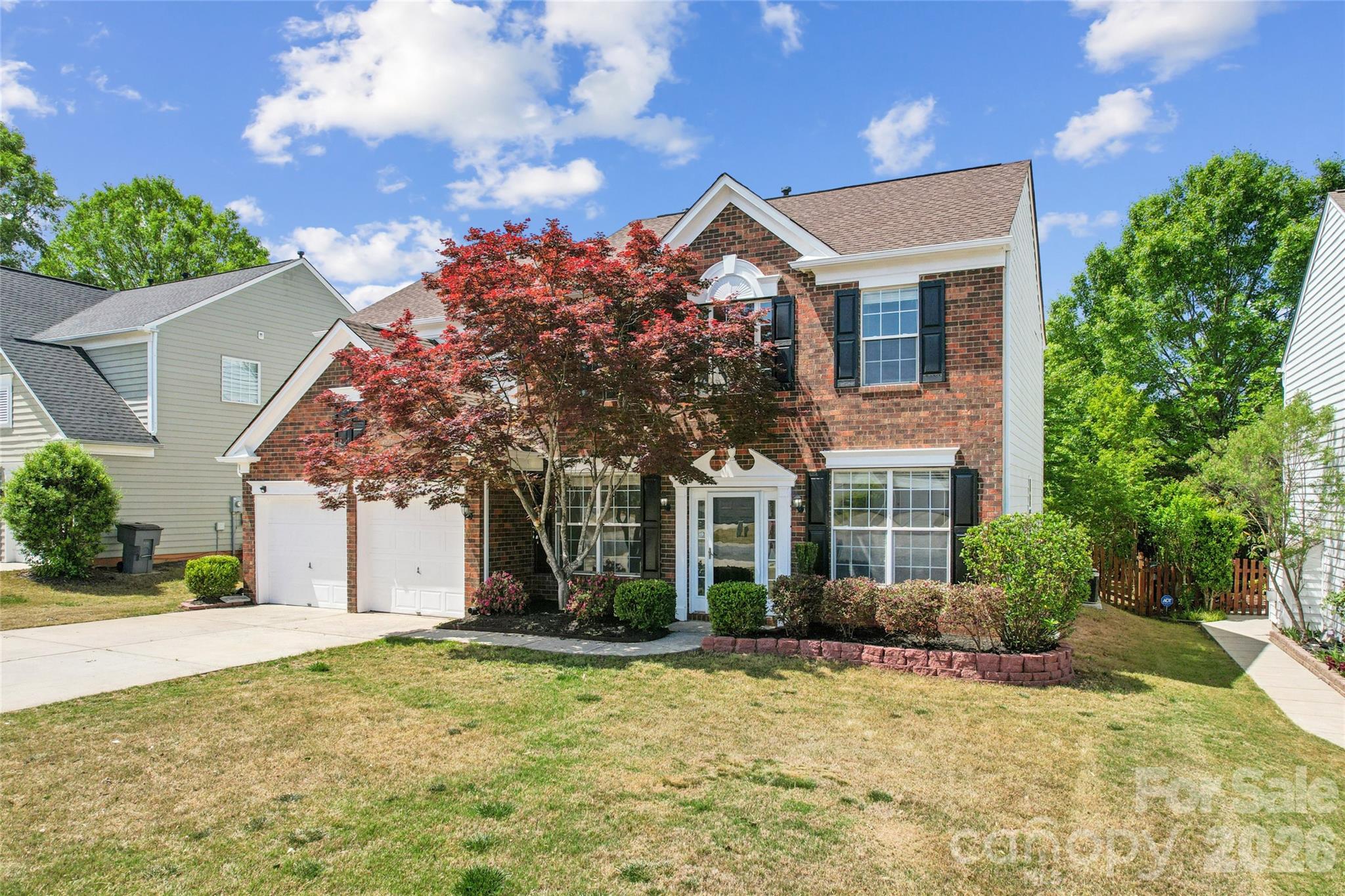 3530 Arborhill Road Charlotte, NC 28270 - Photo 3 of 45 a front view of a house with a yard and garage