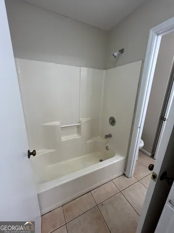 a bathroom with a sink a vanity and a mirror