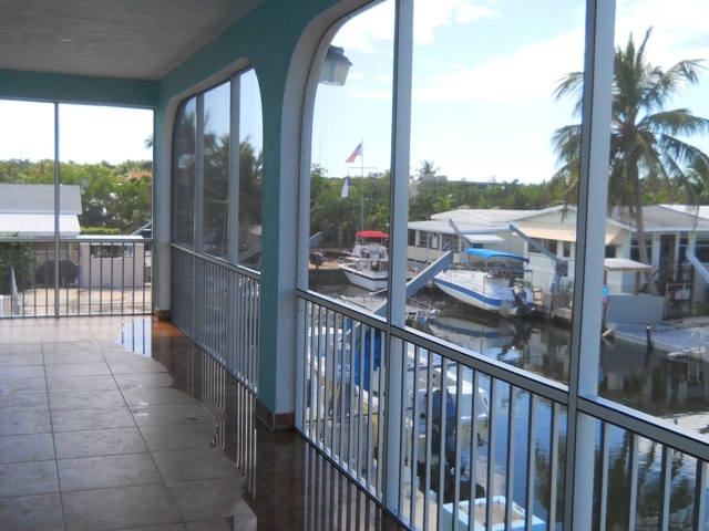 8 Pelican Road Key Largo, FL 33037 - Photo 16 of 17 Screened Porch