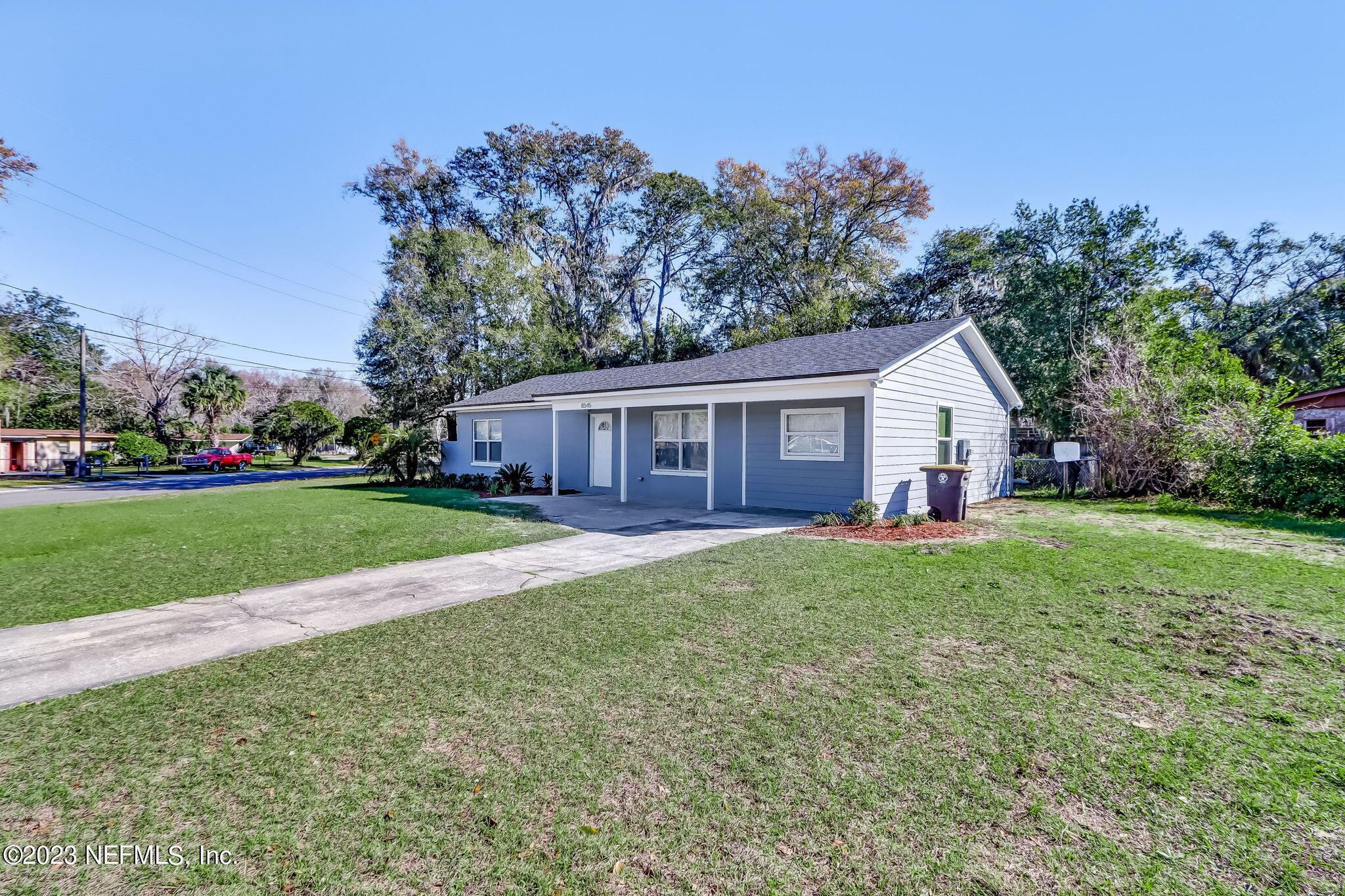8545 Laurens Road Jacksonville, FL 32208 - Photo 2 of 29 a view of a house with backyard and garden