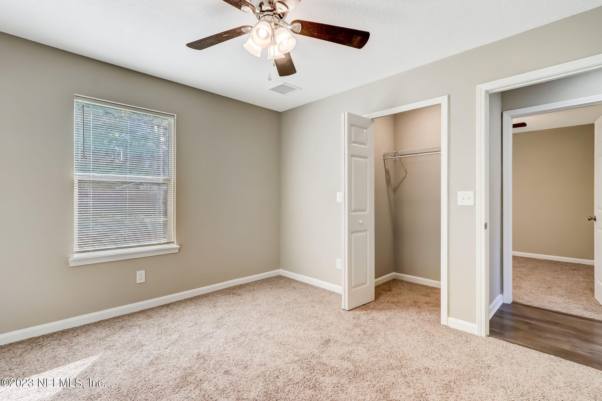 8545 Laurens Road Jacksonville, FL 32208 - Photo 22 of 29 a view of an empty room with a window