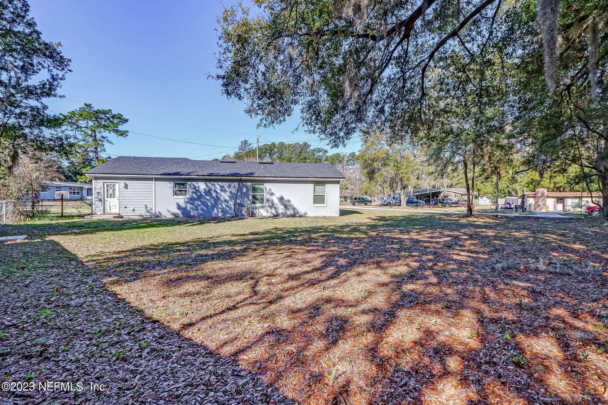 8545 Laurens Road Jacksonville, FL 32208 - Photo 27 of 29 a view of a house with a yard