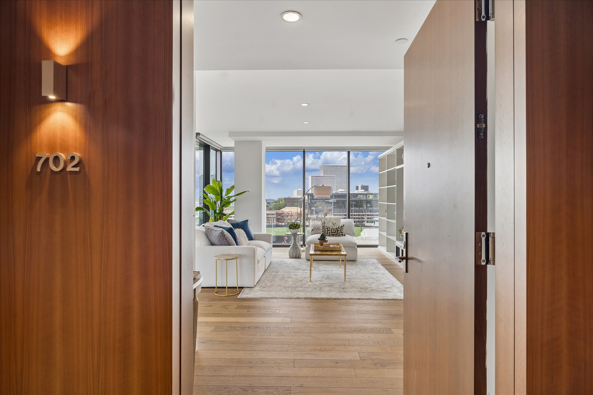 3433 Westheimer Road, Unit 702 Houston, TX 77027 - Photo 32 of 48 Welcome home - where floor-to-ceiling glass and sweeping city views create an unforgettable first impression!