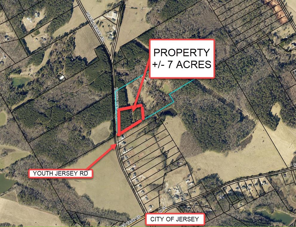 7-ac Youth Jersey Road Covington, GA 30014 - Photo 3 of 34 a sign that is on the side of a building