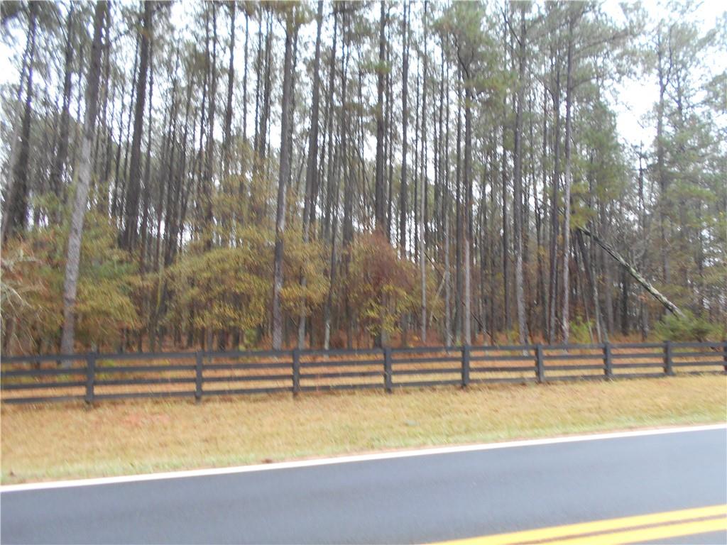 7-ac Youth Jersey Road Covington, GA 30014 - Photo 7 of 34 a view of swimming pool with outdoor seating and trees