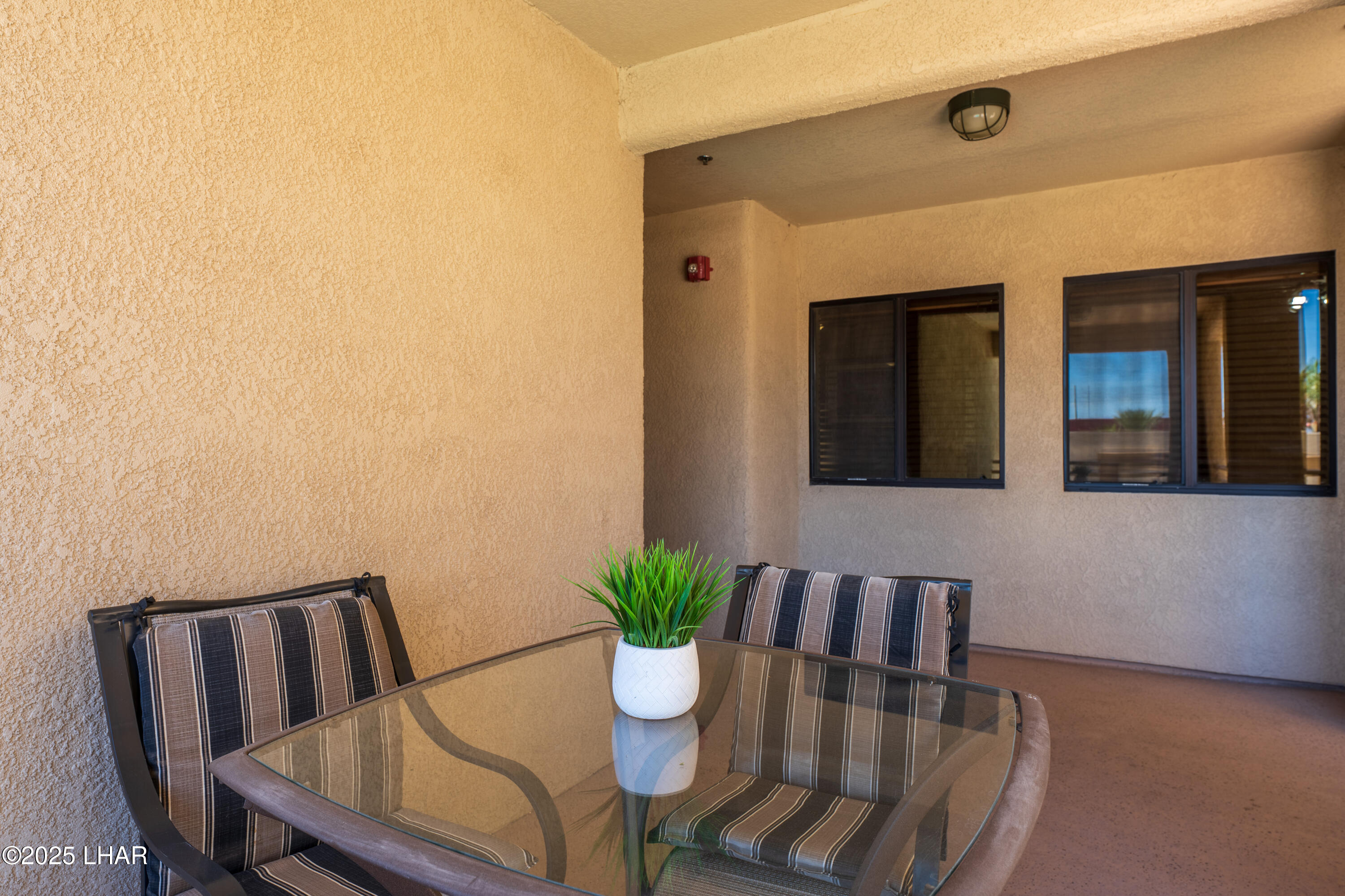 433 London Bridge Road, Unit B202 Lake Havasu City, AZ 86403 - Photo 41 of 63 Each Condo has their patio area in front looking out to the Pool