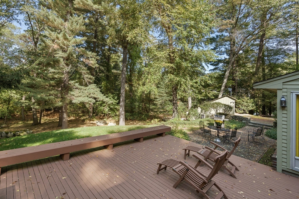 60 Possum Road Weston, MA 02493 - Photo 3 of 21 a view of a backyard with sitting area and furniture