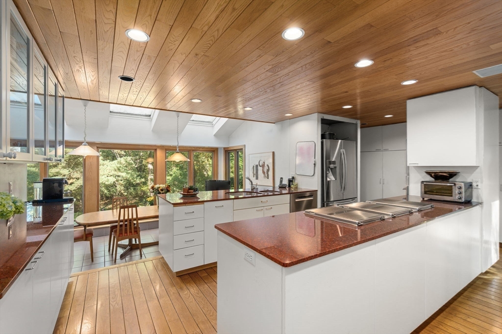 60 Possum Road Weston, MA 02493 - Photo 5 of 21 a kitchen with counter top space a sink and appliances