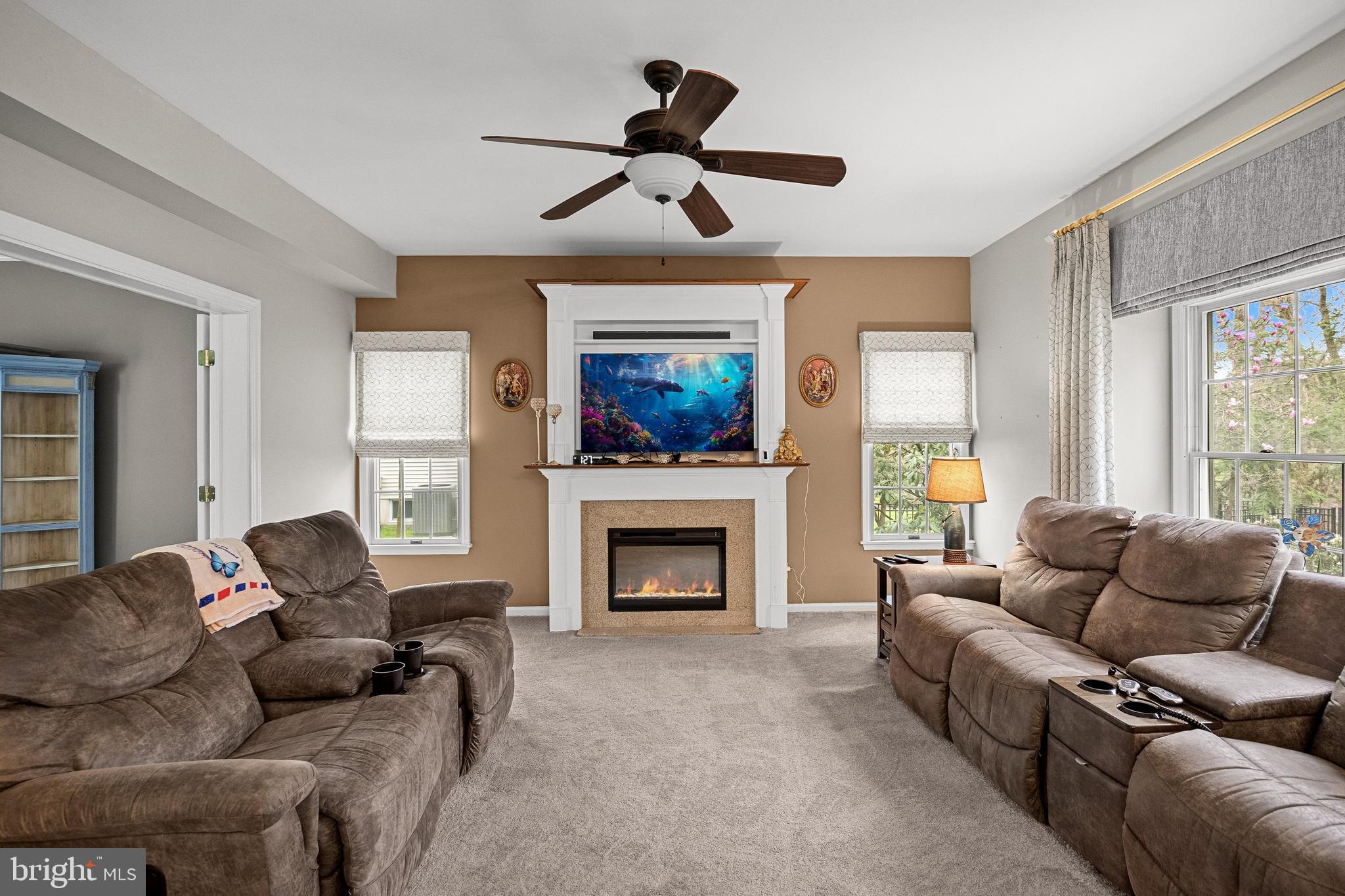 4 Mill Run Court Medford, NJ 08055 - Photo 15 of 53 a living room with furniture a fireplace and a window