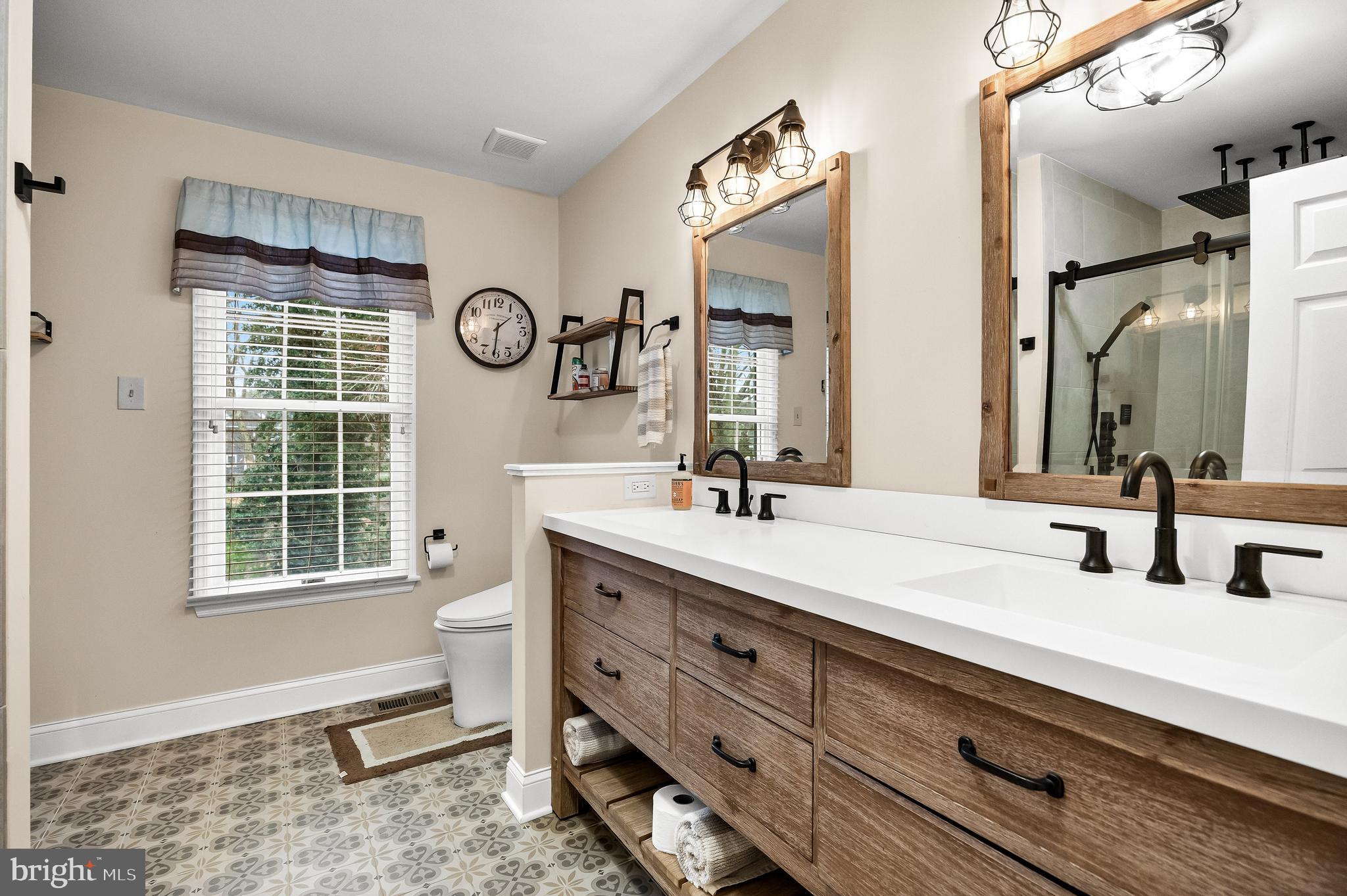 4 Mill Run Court Medford, NJ 08055 - Photo 22 of 53 a bathroom with a double vanity sink mirror and next to a window