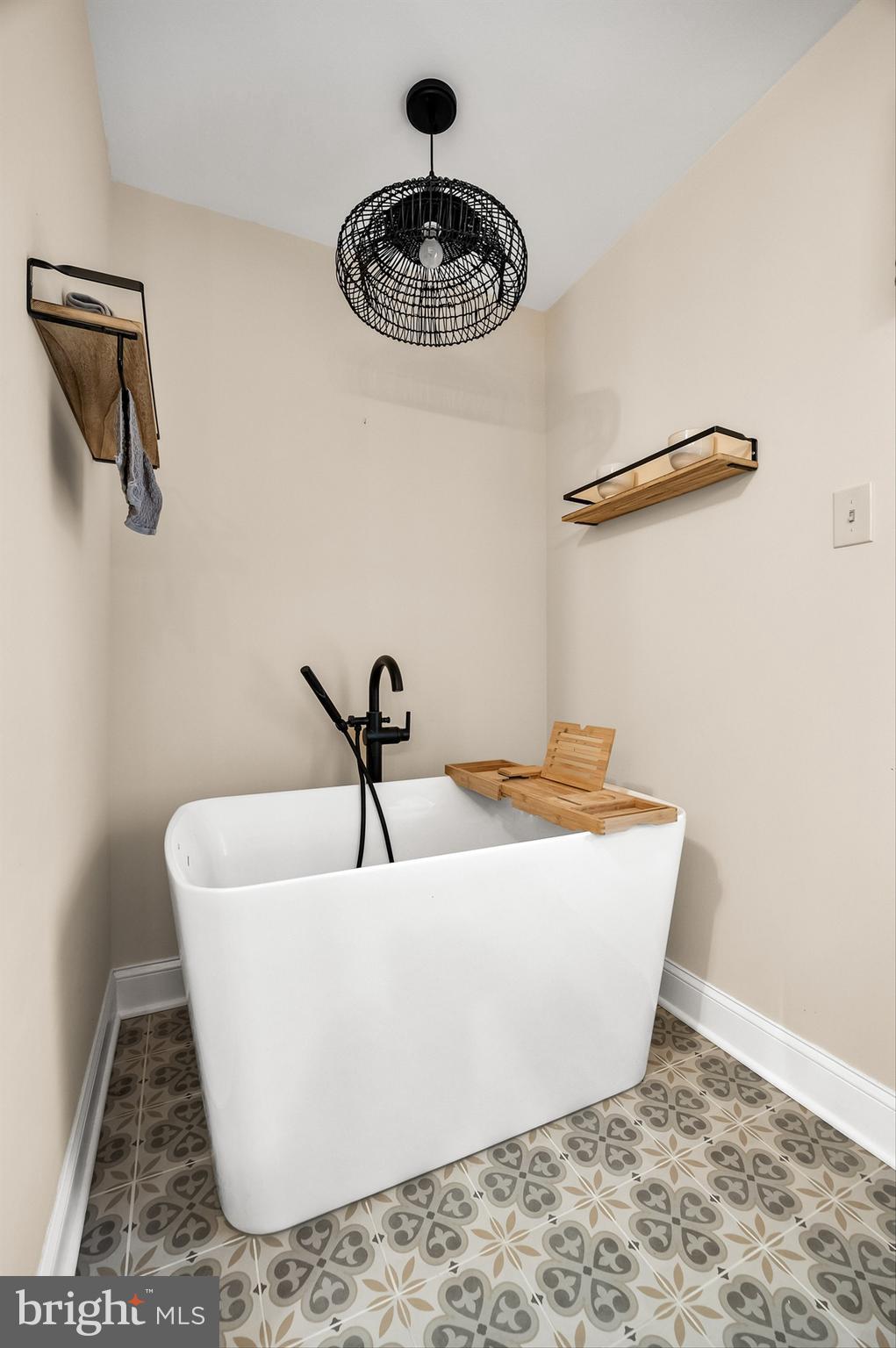 4 Mill Run Court Medford, NJ 08055 - Photo 23 of 53 a white tub sitting next to a shower