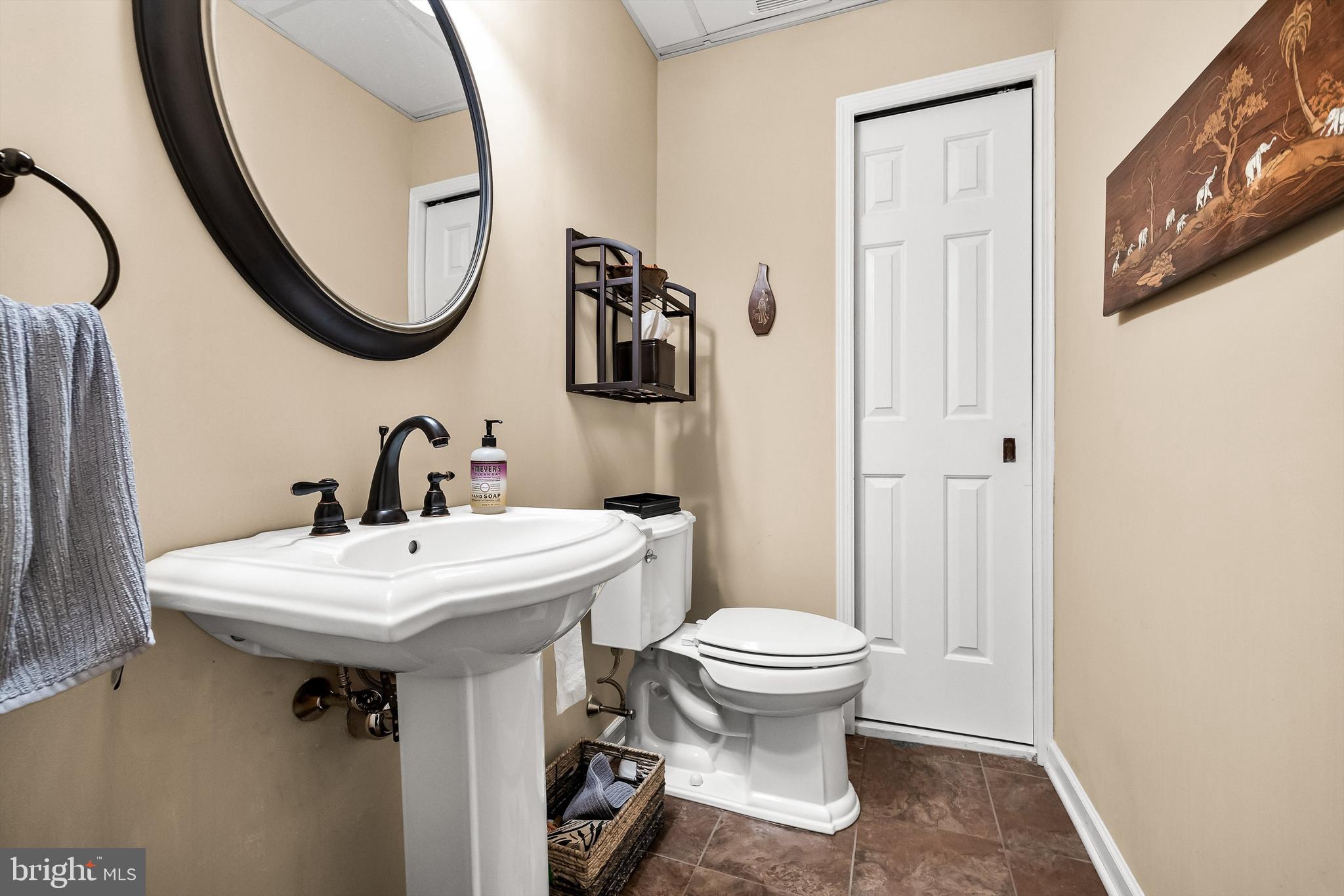 4 Mill Run Court Medford, NJ 08055 - Photo 34 of 53 a bathroom with a sink and mirror with toilet