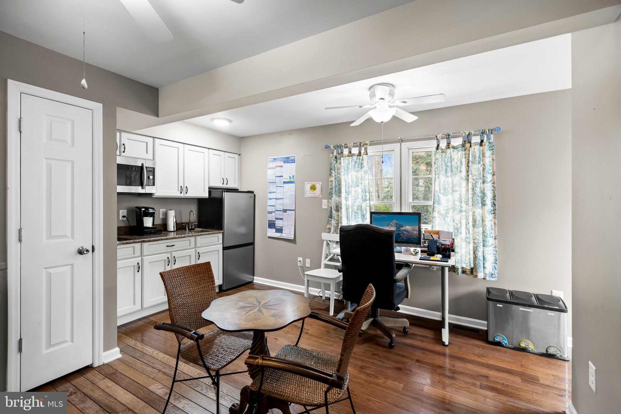 4 Mill Run Court Medford, NJ 08055 - Photo 36 of 53 a view of a dining room with furniture a chandelier and wooden floor