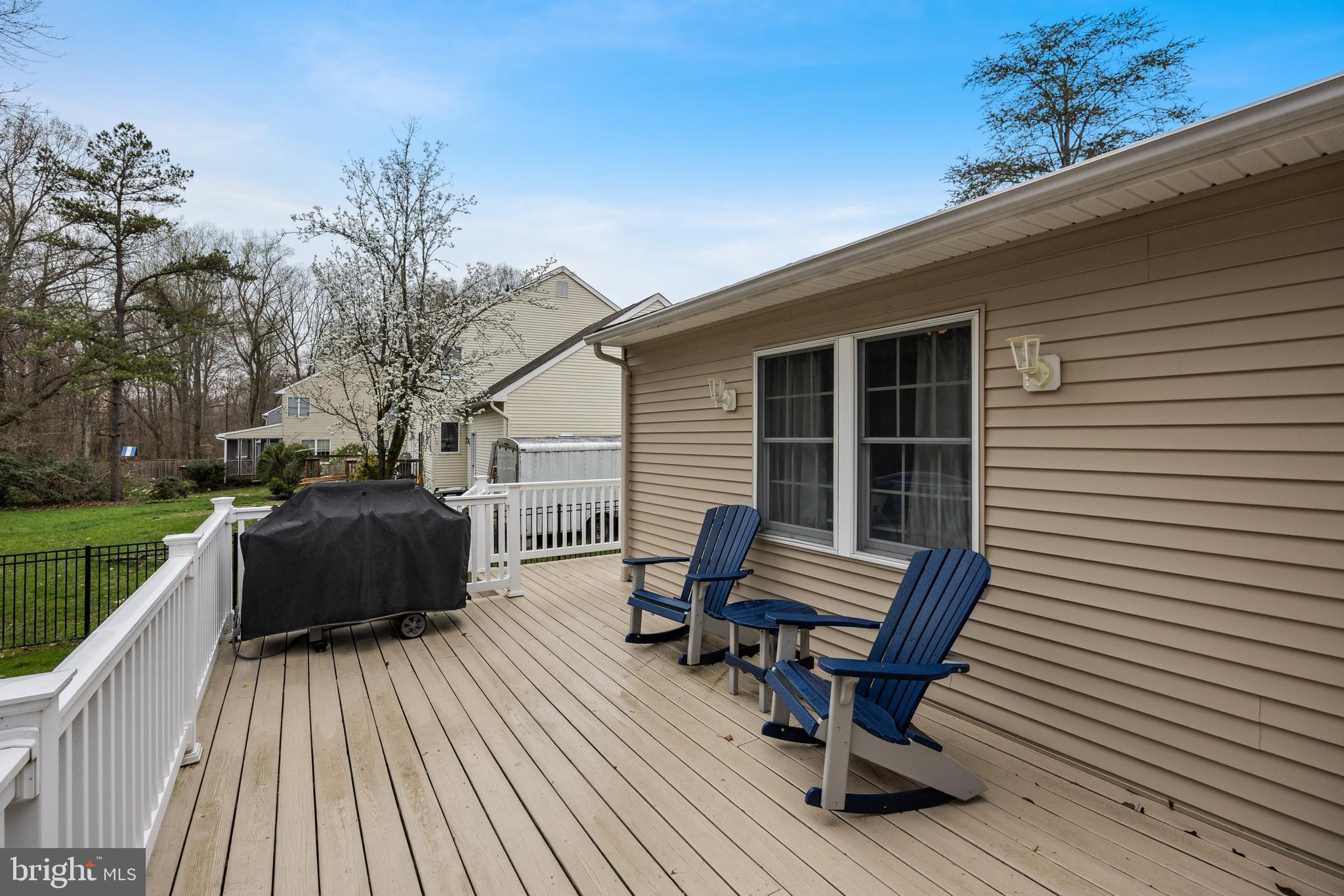 4 Mill Run Court Medford, NJ 08055 - Photo 43 of 53 a view of a roof deck with wooden floor and fence