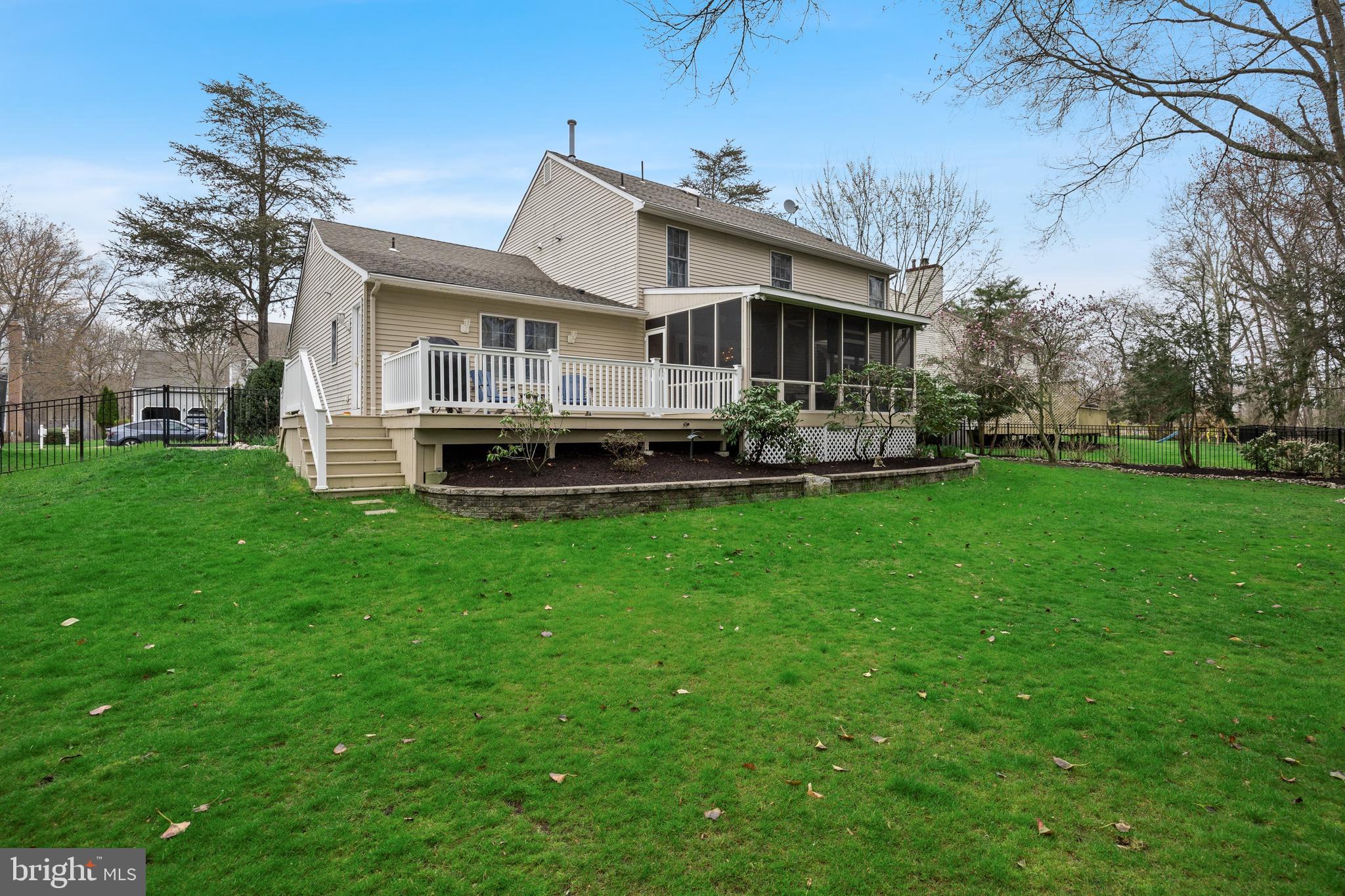 4 Mill Run Court Medford, NJ 08055 - Photo 45 of 53 a front view of a house with a garden and deck