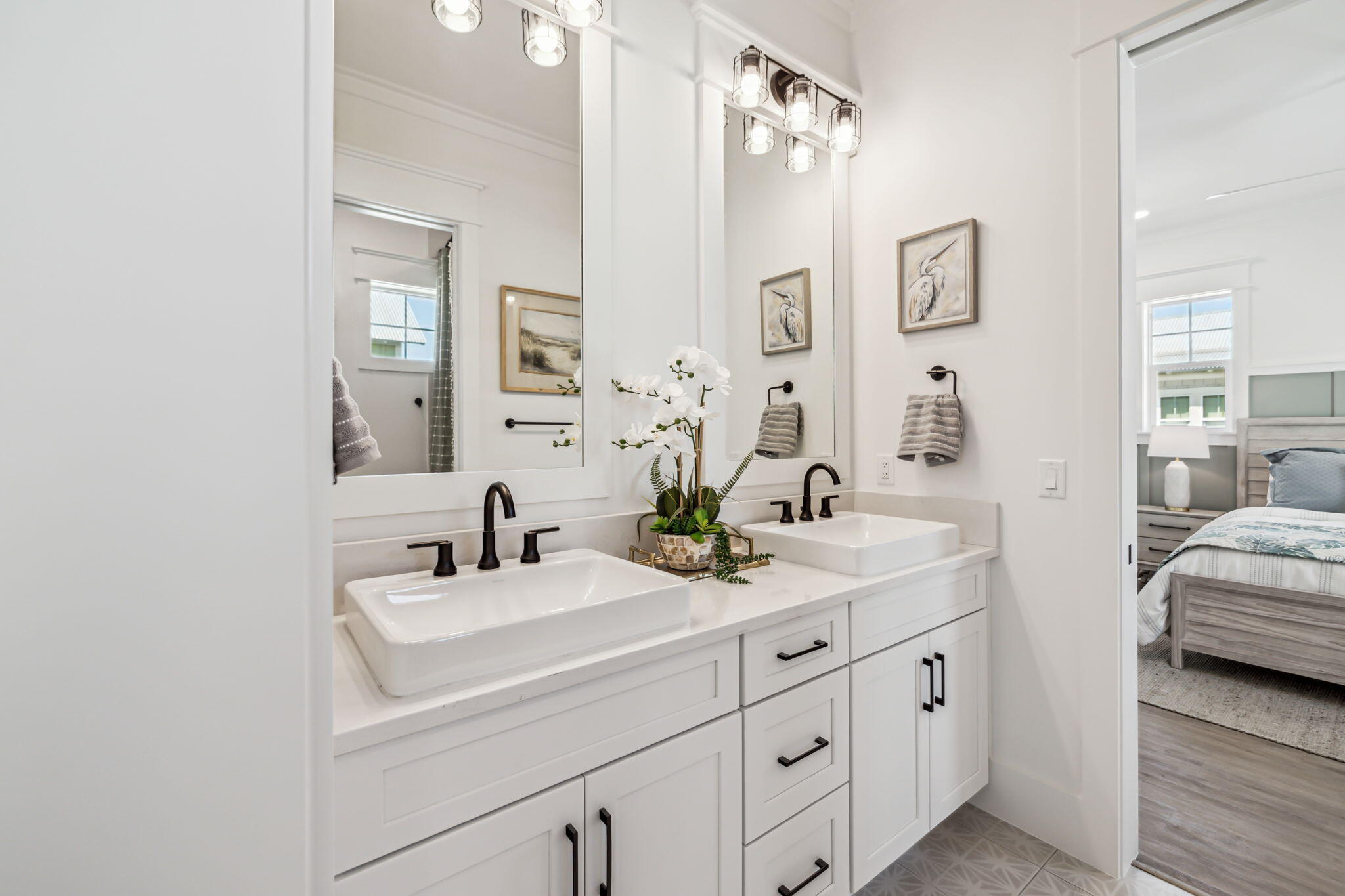 33 Grayton Boulevard Santa Rosa Beach, FL 32459 - Photo 33 of 48 a bathroom with double sink and a mirror