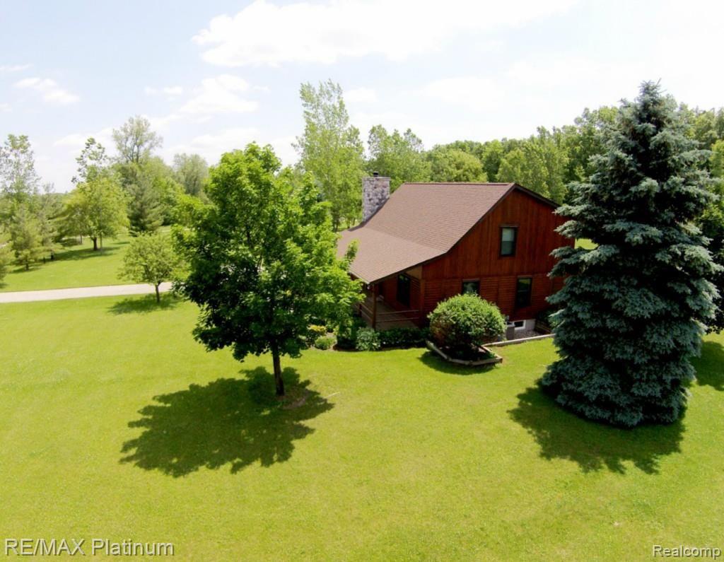 3595 Warner Road Howell, MI 48855 - Photo 29 of 42 3595 Warner Road Side Yard