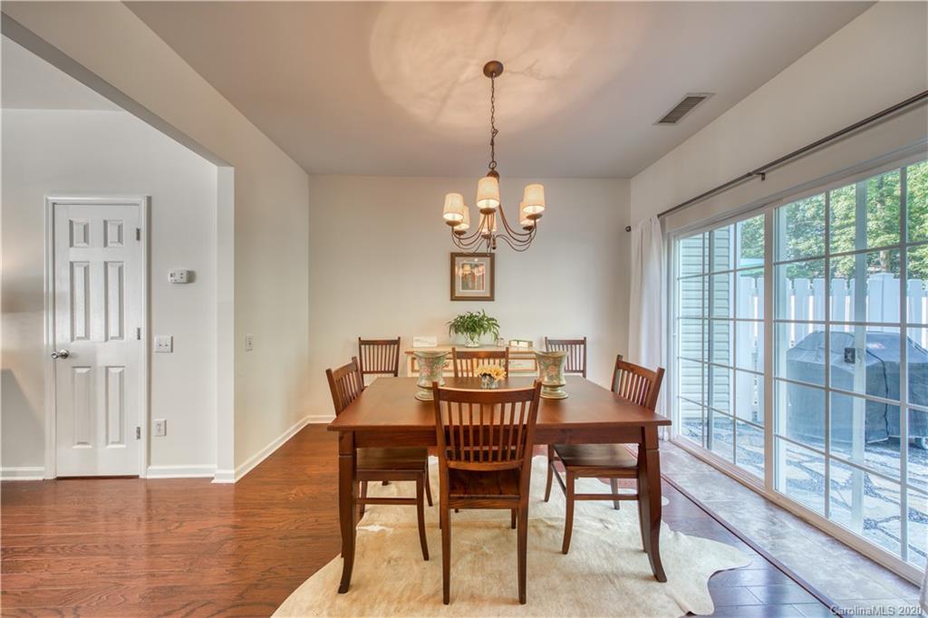 6921 Rothchild Drive Charlotte, NC 28270 - Photo 12 of 26 a view of a dining room with furniture window and outside view