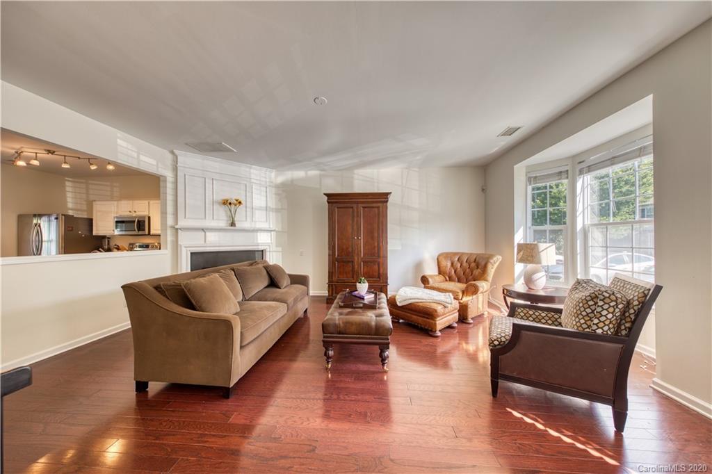 6921 Rothchild Drive Charlotte, NC 28270 - Photo 3 of 26 a living room with furniture and a large window