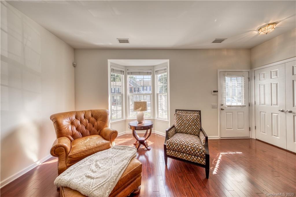 6921 Rothchild Drive Charlotte, NC 28270 - Photo 7 of 26 a living room with furniture and a wooden floor