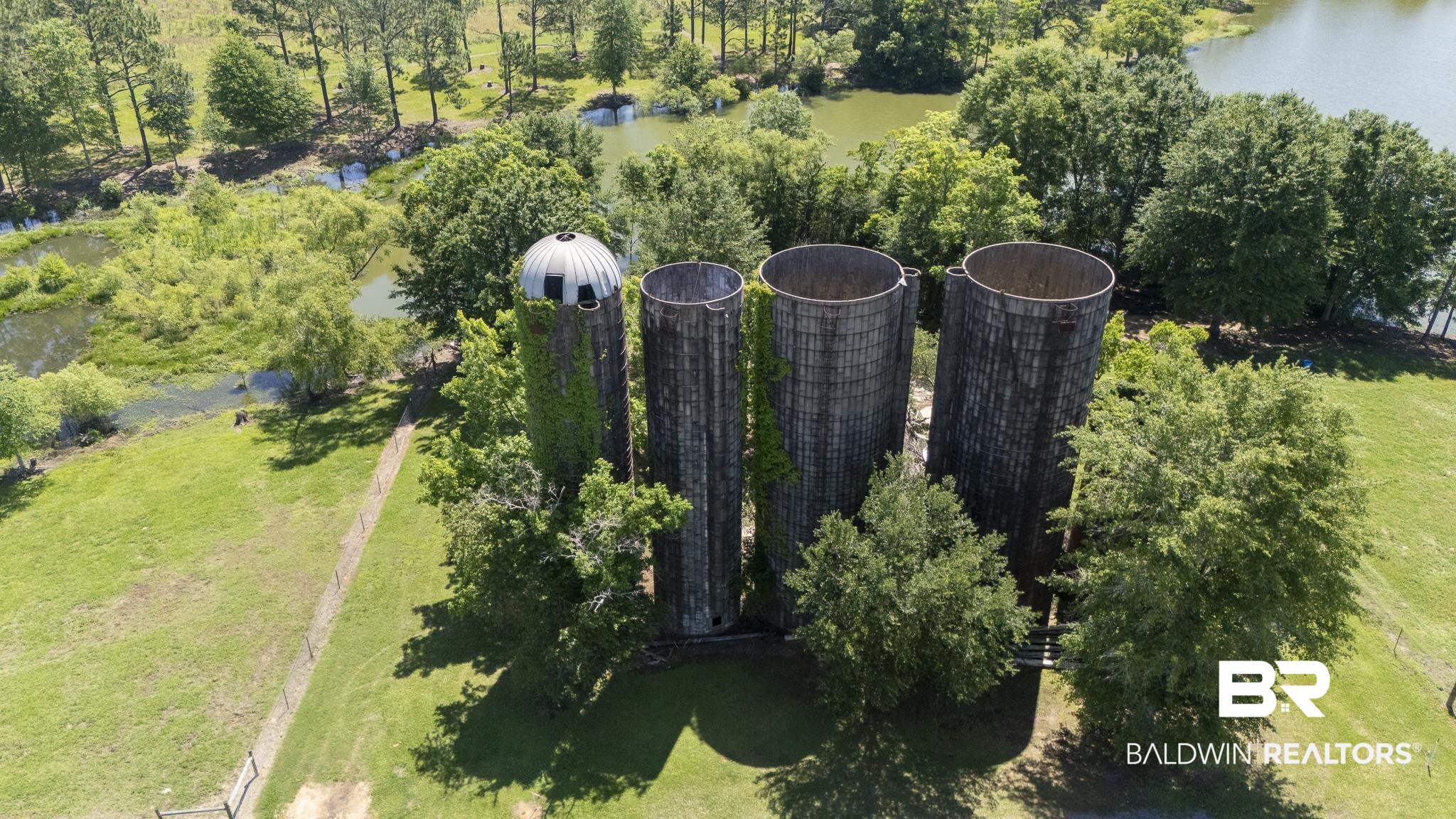 30580 County Road 49 Loxley, AL 36551 - Photo 32 of 32 Four cylindrical structures featuring a domed top on the leftmost structure