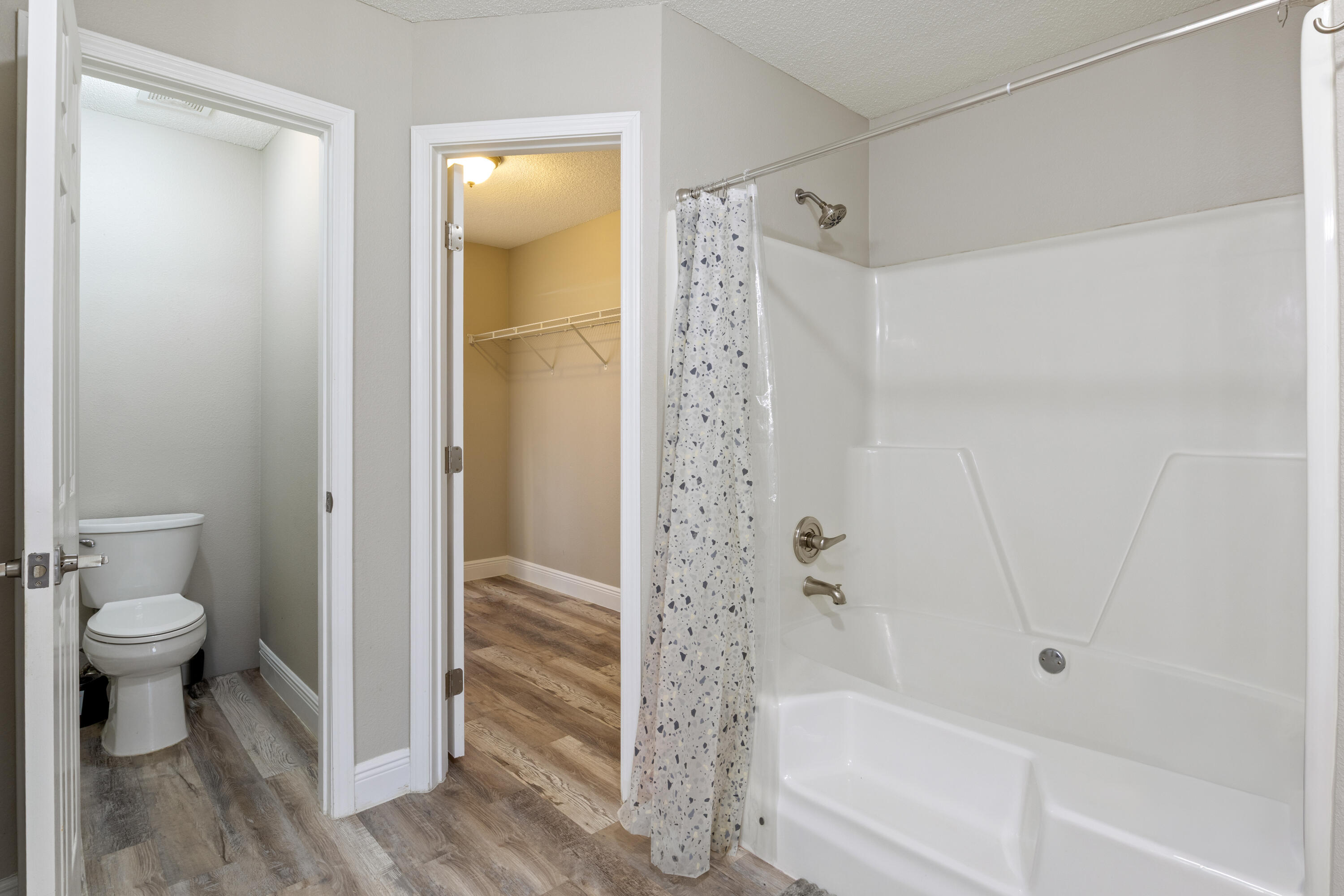 2005 Cardinal Lane Navarre, FL 32566 - Photo 19 of 37 a bathroom with a shower and a toilet