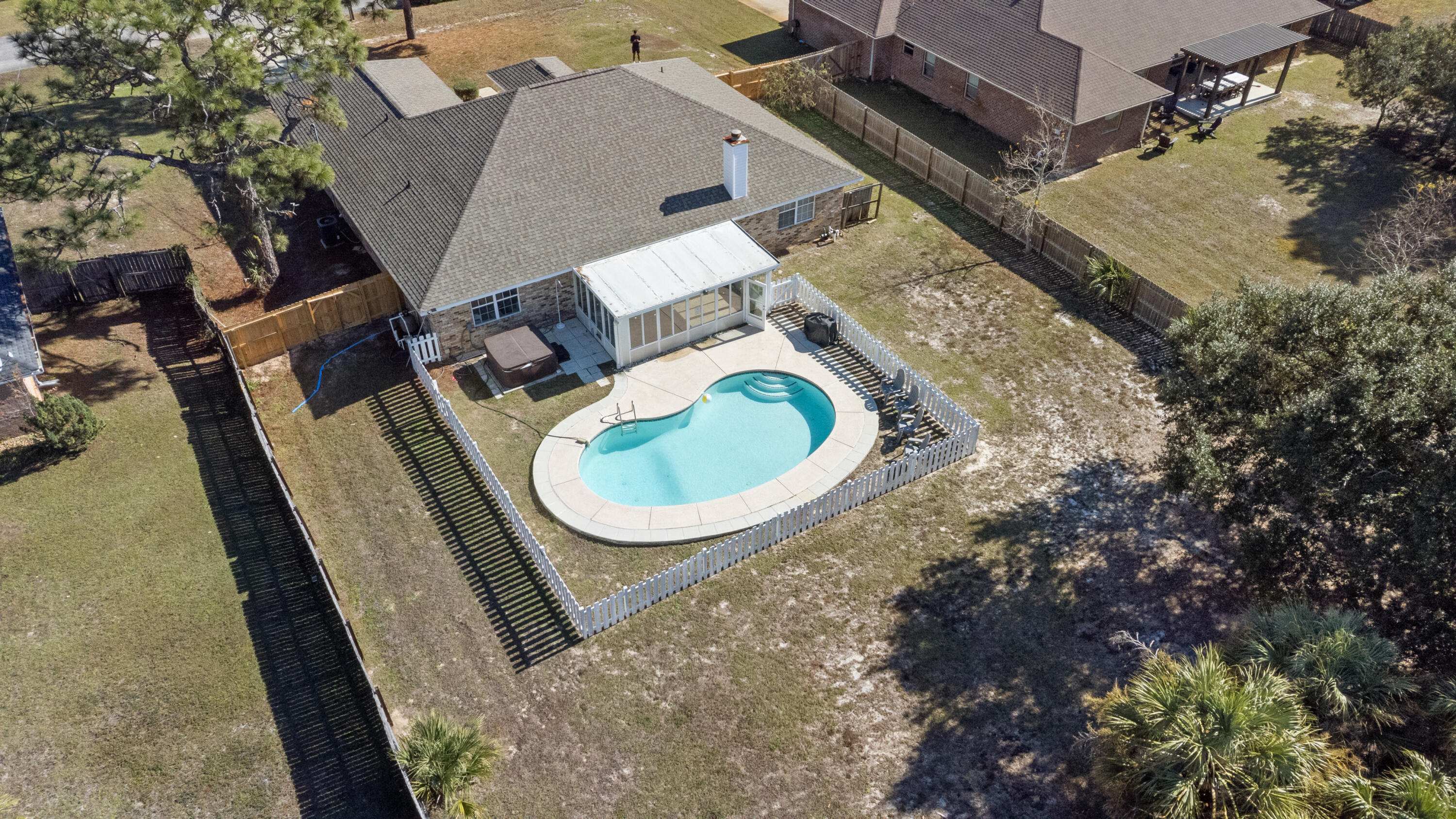 2005 Cardinal Lane Navarre, FL 32566 - Photo 32 of 37 an aerial view of a house with backyard space and balcony