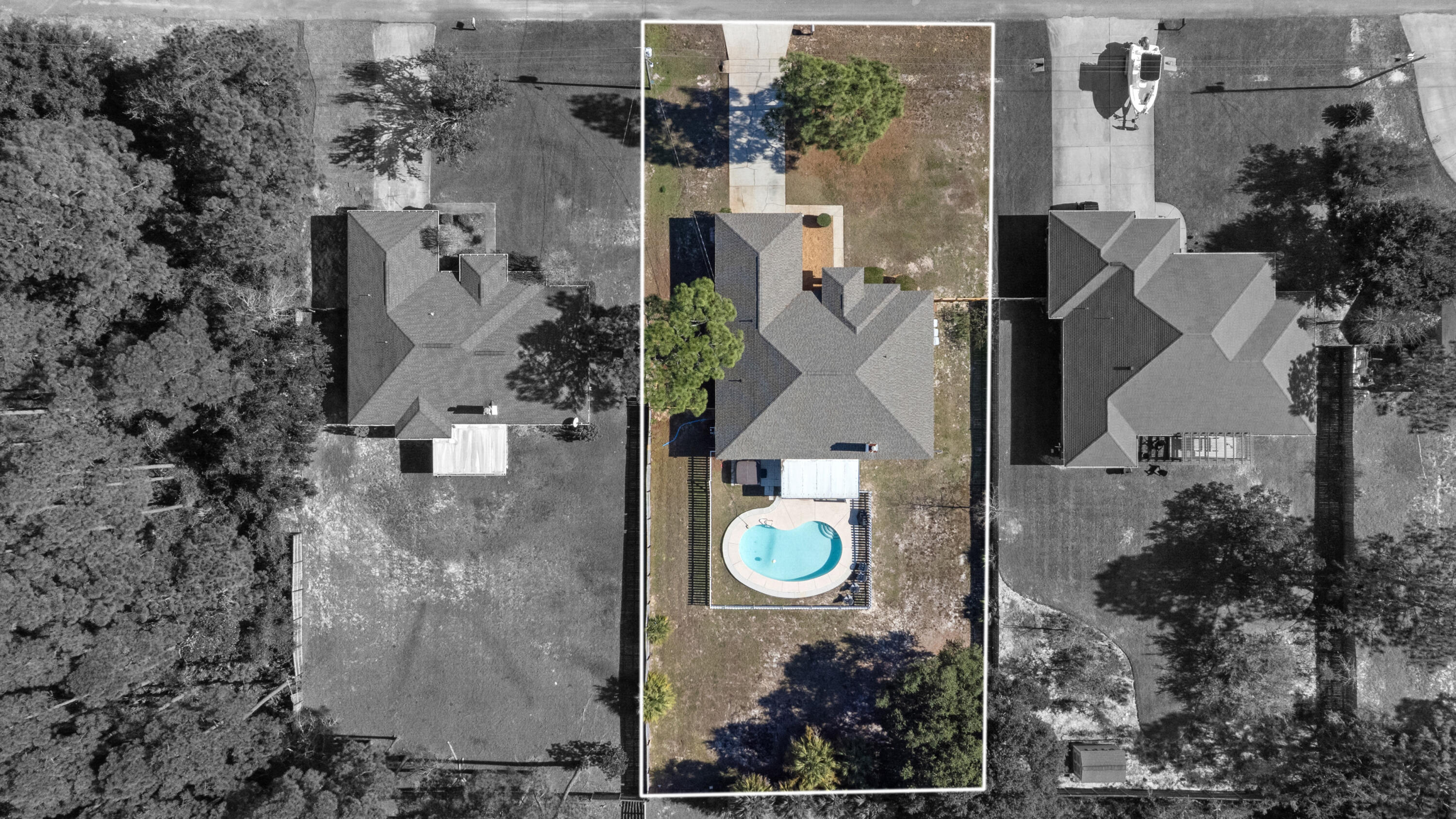 2005 Cardinal Lane Navarre, FL 32566 - Photo 34 of 37 an aerial view of residential house with outdoor space and parking