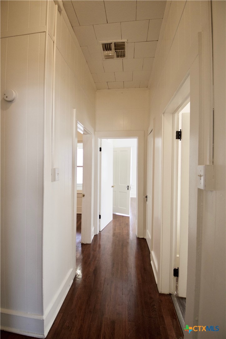 617 North 6th Street Temple, TX 76501 - Photo 21 of 38 a view of a hallway with wooden floor