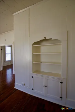 a view of small space with wooden floor