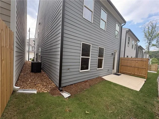 a view of backyard of a house