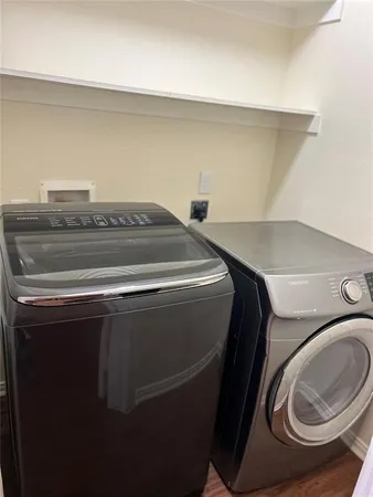 a utility room with dryer and washer