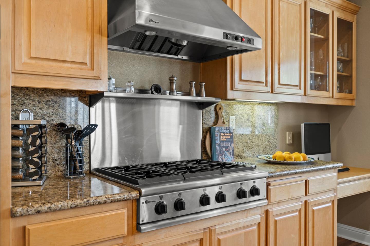 2434 Lakeside Circle Livermore, CA 94550 - Photo 11 of 35 a kitchen with a stove and a white cabinets