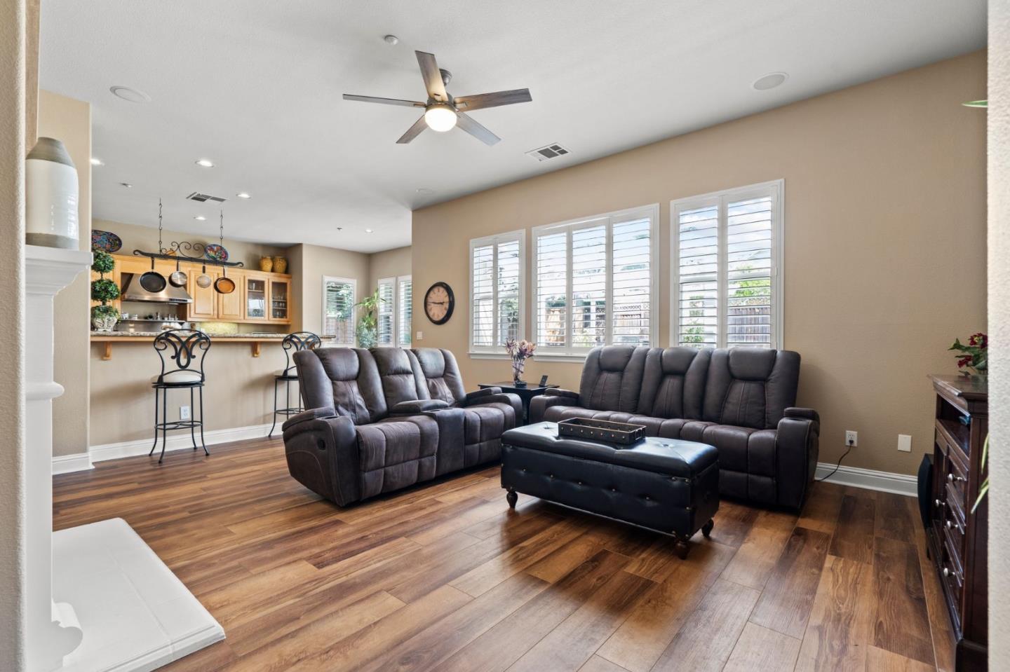 2434 Lakeside Circle Livermore, CA 94550 - Photo 15 of 35 a living room with furniture and a wooden floor