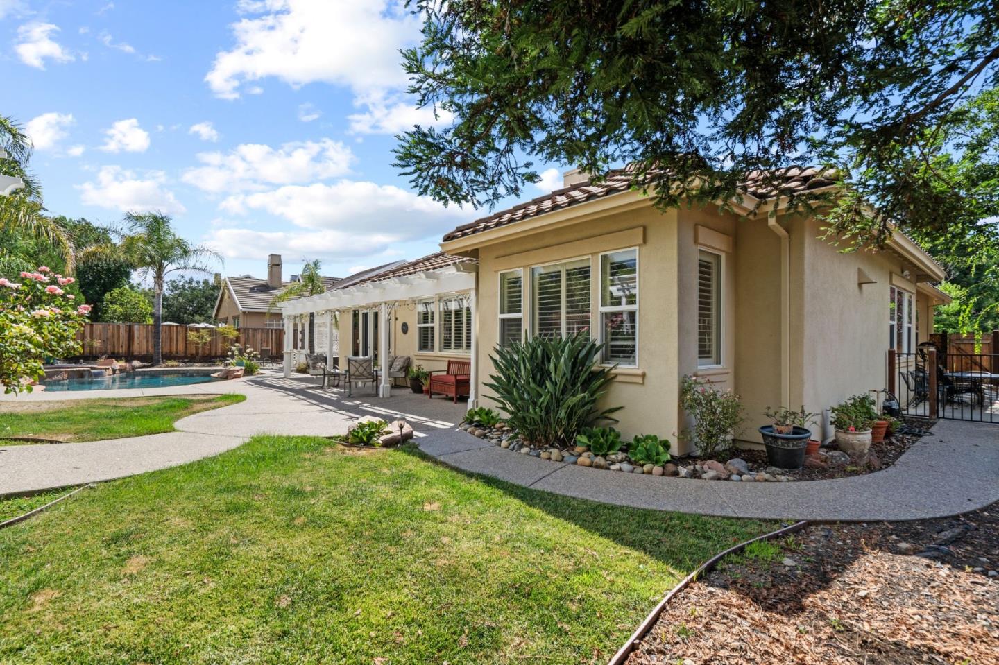 2434 Lakeside Circle Livermore, CA 94550 - Photo 33 of 35 a front view of a house with garden