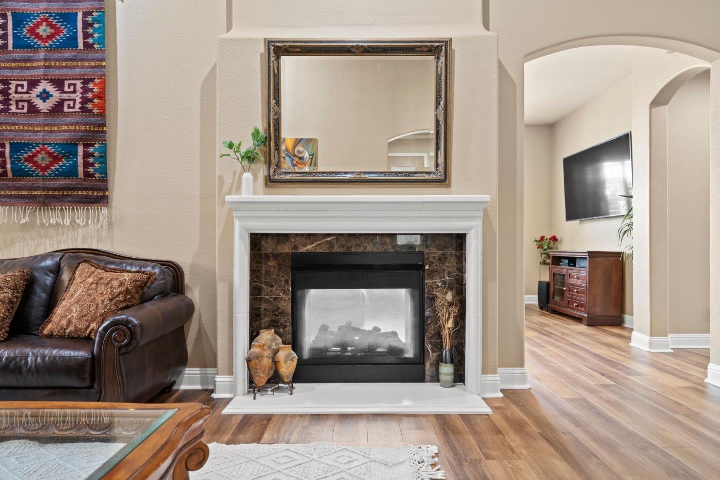 2434 Lakeside Circle Livermore, CA 94550 - Photo 6 of 35 a living room with furniture and a fireplace