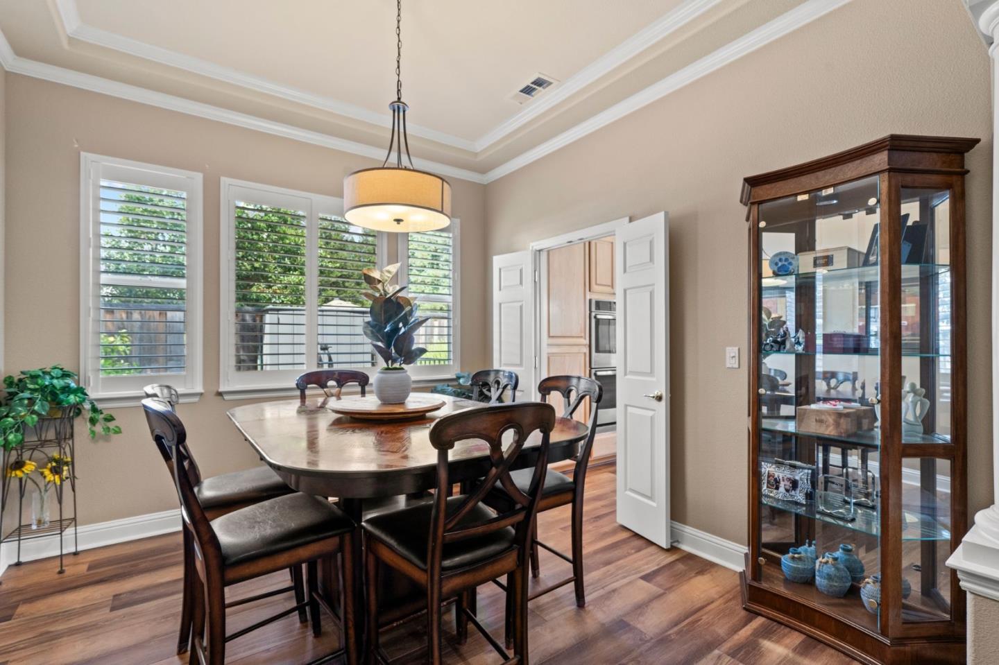 2434 Lakeside Circle Livermore, CA 94550 - Photo 8 of 35 a dining room with furniture window wooden floor