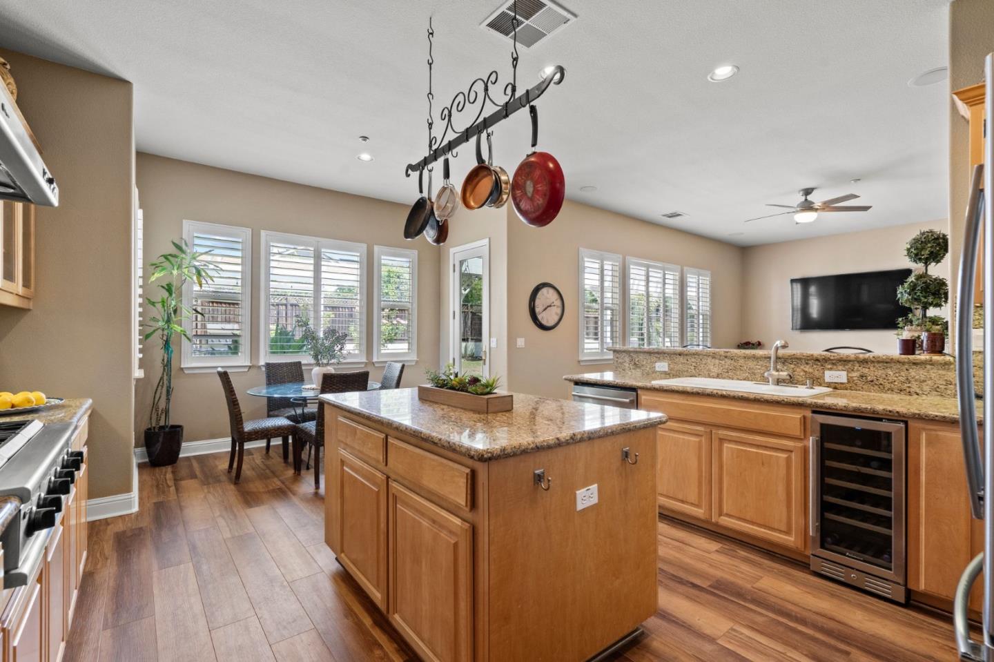 2434 Lakeside Circle Livermore, CA 94550 - Photo 10 of 35 a kitchen with lots of counter top space and wooden floor