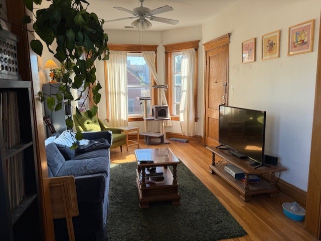 3330 West Evergreen Avenue Chicago, IL 60651 - Photo 15 of 16 a living room with furniture and a flat screen tv