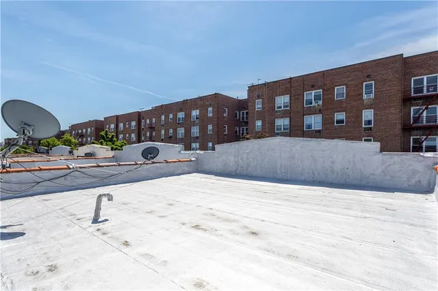 a swimming pool view with a outdoor seating